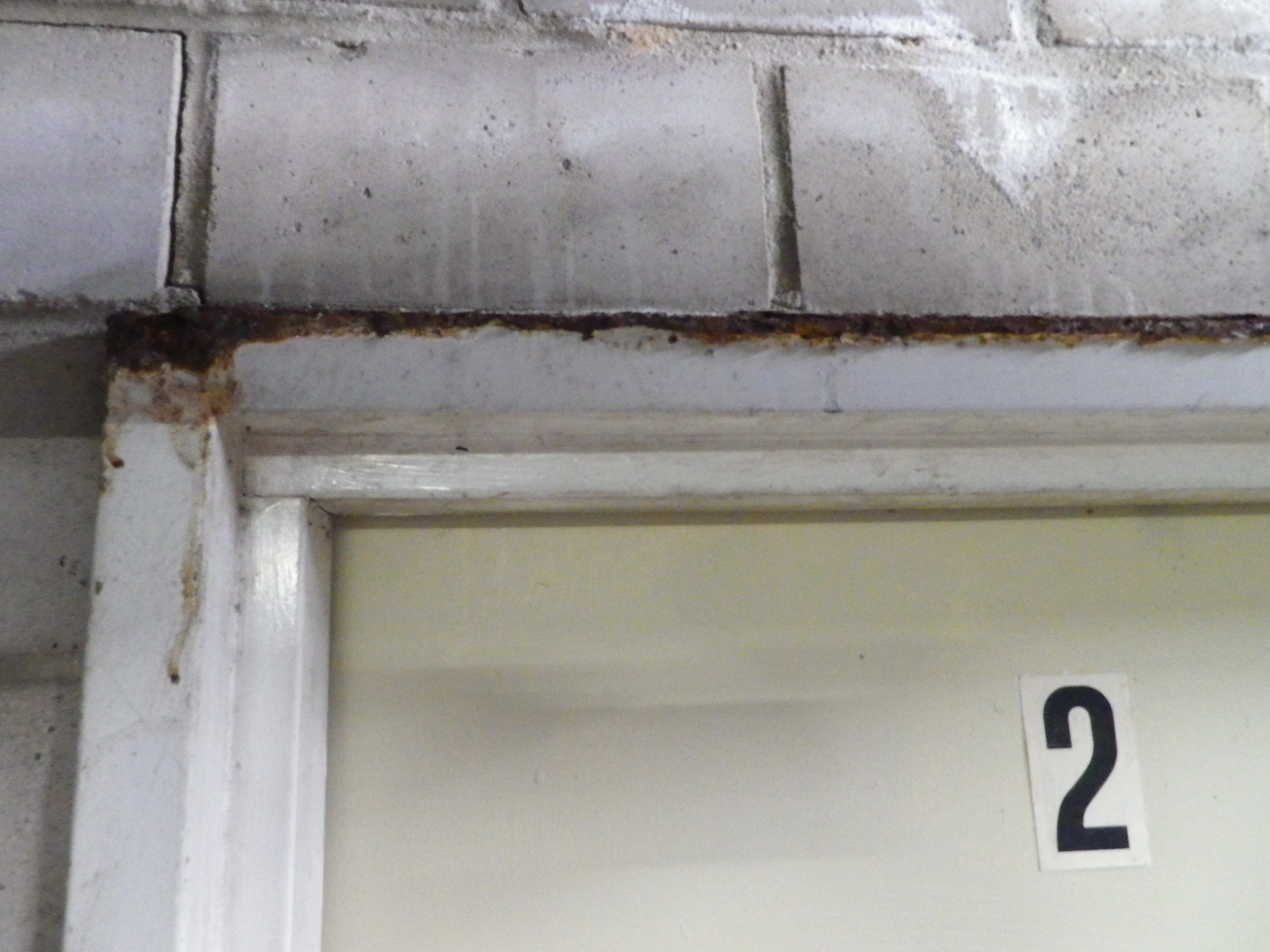 SP52948-Block-A-external-fire-door-2-rusted-frame-due-to-water-damages-photo-1-16Apr2021.jpg