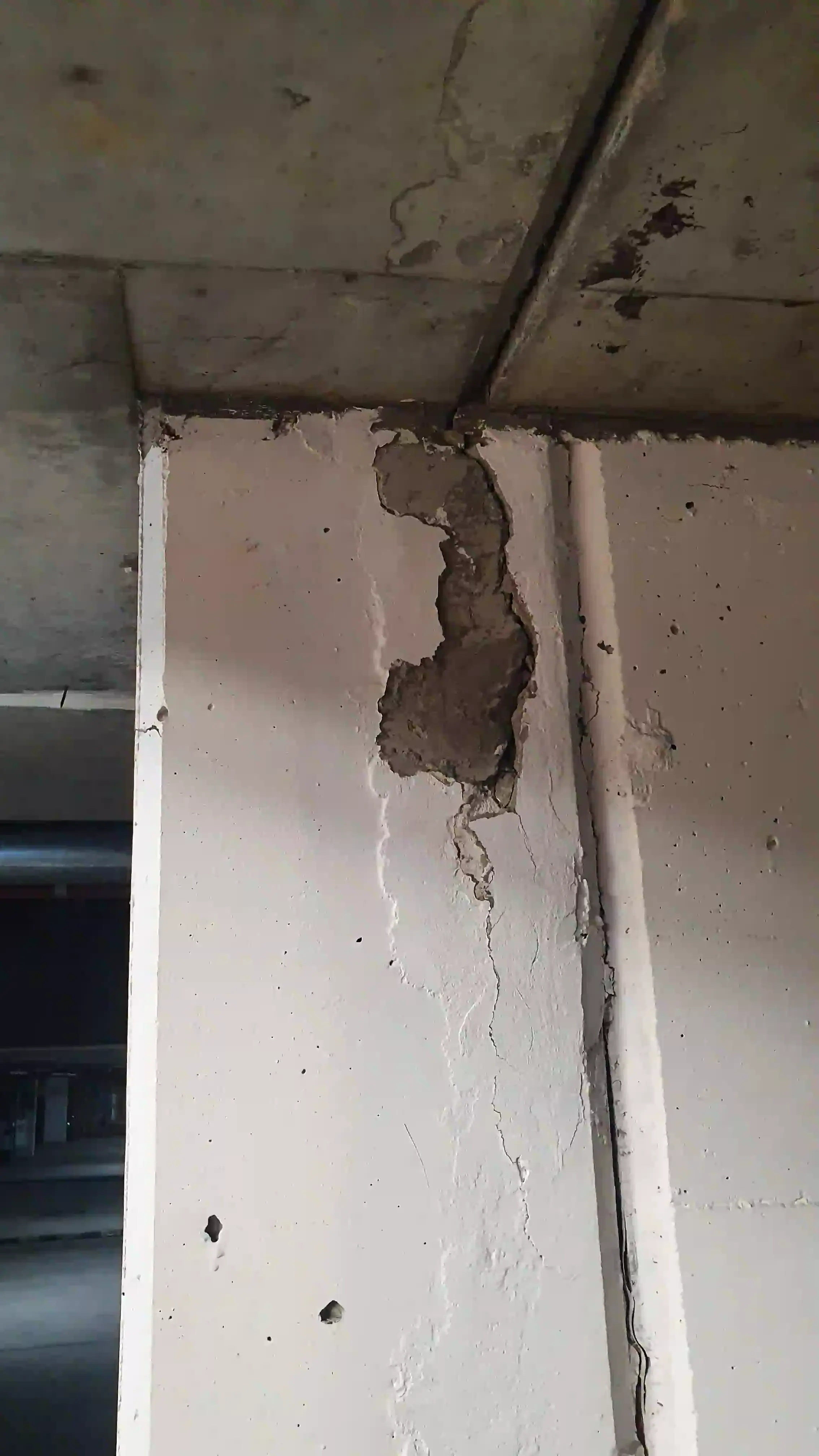 SP52948-damaged-wall-due-to-excessive-water-leaks-garage-area-below-Block-B-photo-1-8Jun2022