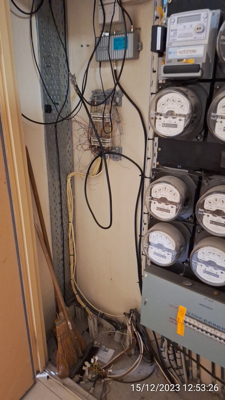 SP52948-electric-meter-cabinet-with-forgotten-cleaning-brooms-since-March-2021-photo-taken-on-15Dec2023.webp