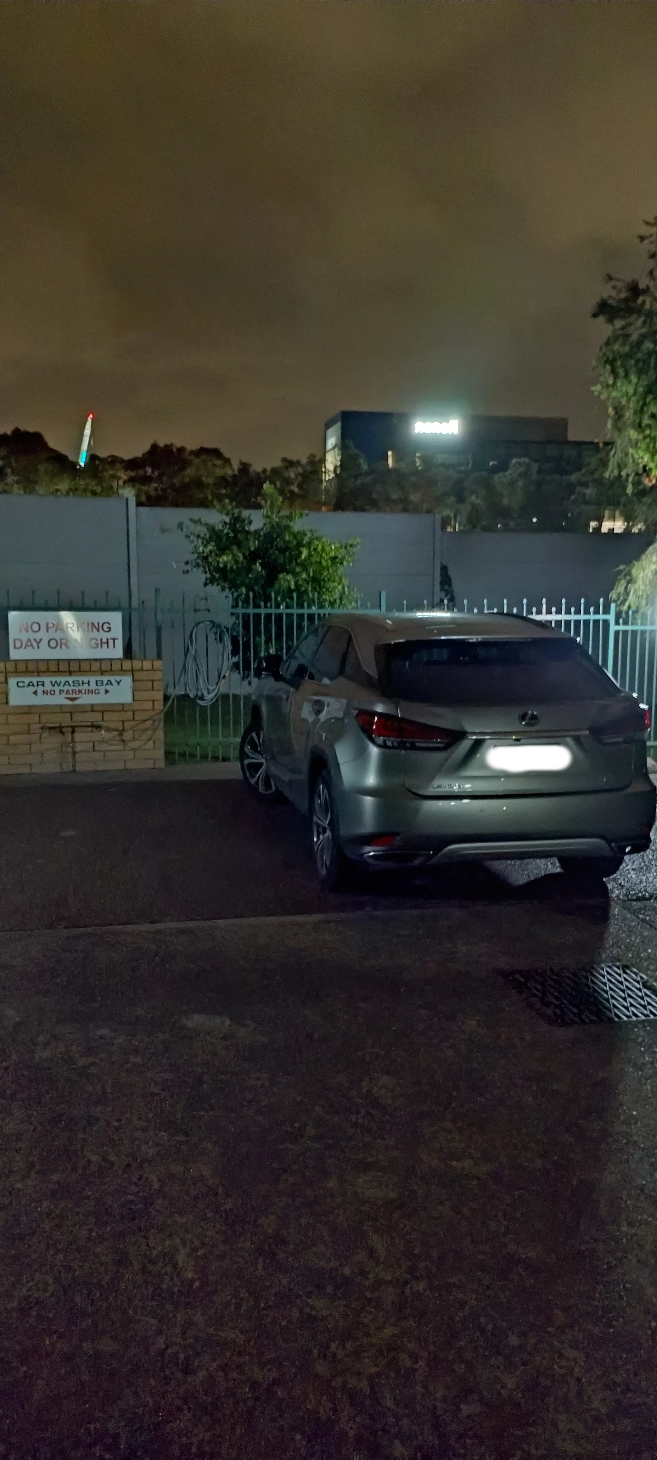 SP52948-illegally-parked-car-in-front-of-committee-member-towhouse-Lot-200-and-carwash-area-photo-5-12Nov2022.webp