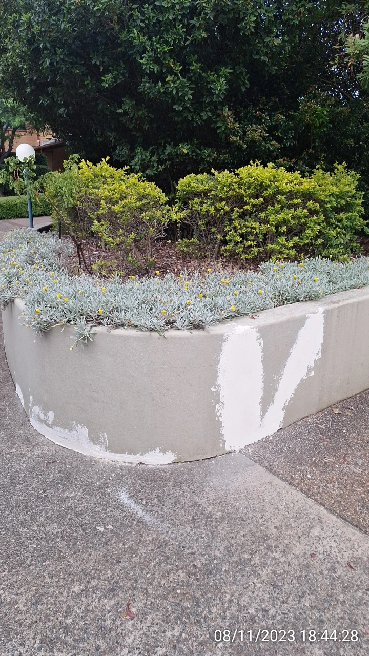 SP52948-repeated-repairs-damaged-garden-bed-wall-near-townhouses-photo-1-8Nov2023.webp