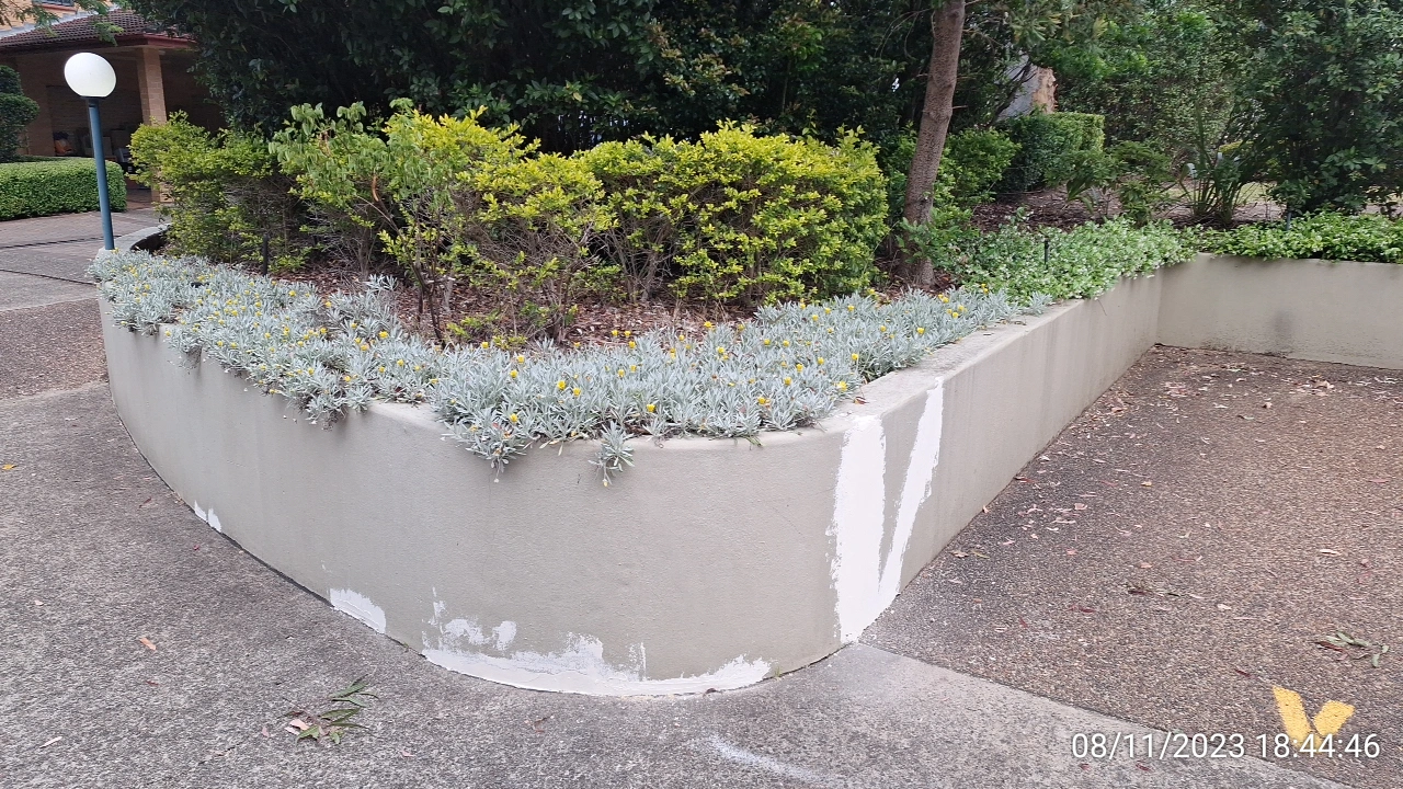 SP52948-repeated-repairs-damaged-garden-bed-wall-near-townhouses-photo-3-8Nov2023.webp