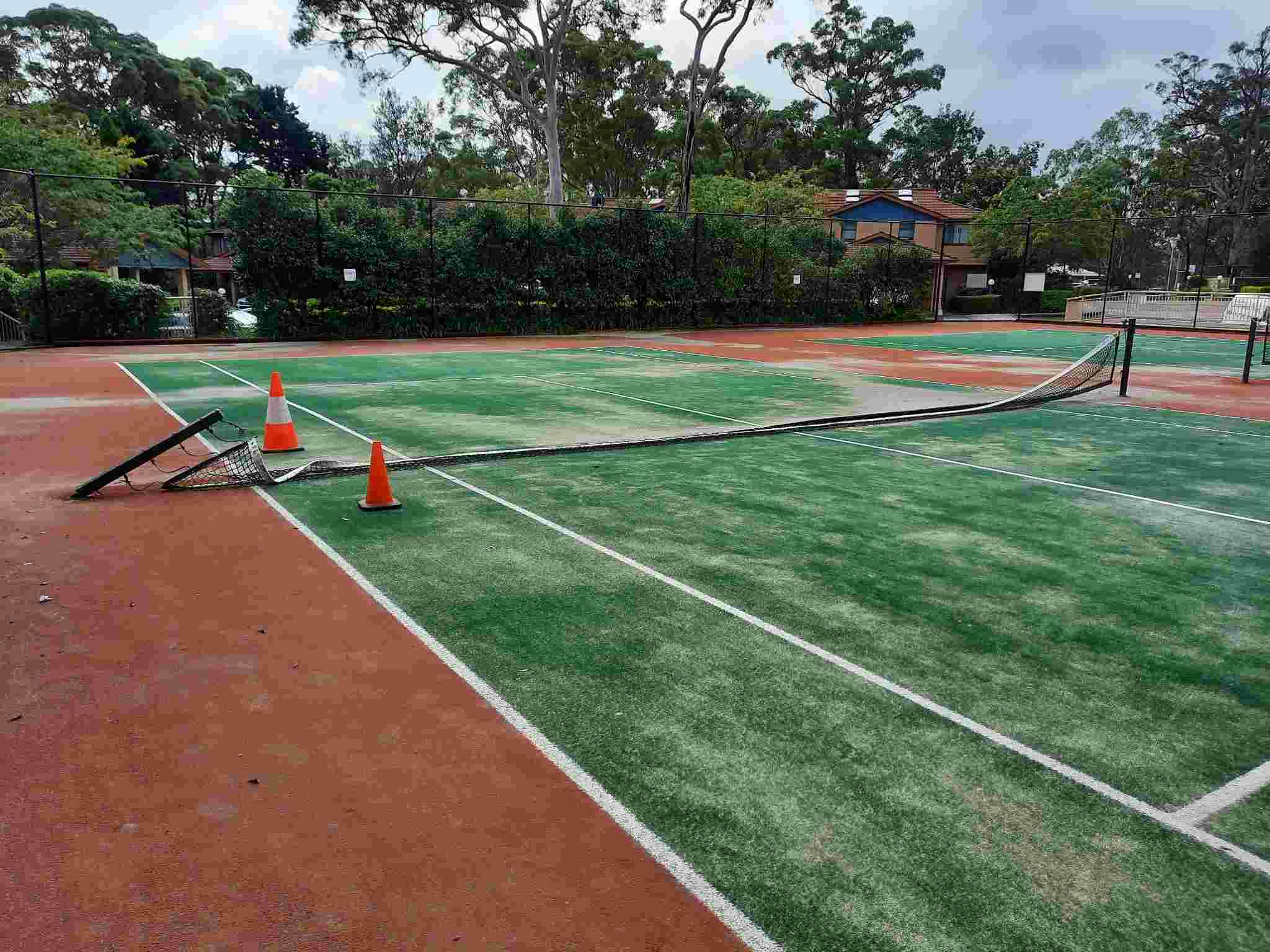 SP52948-tennis-court-1-damage-photo-1-12Apr2022.jpg