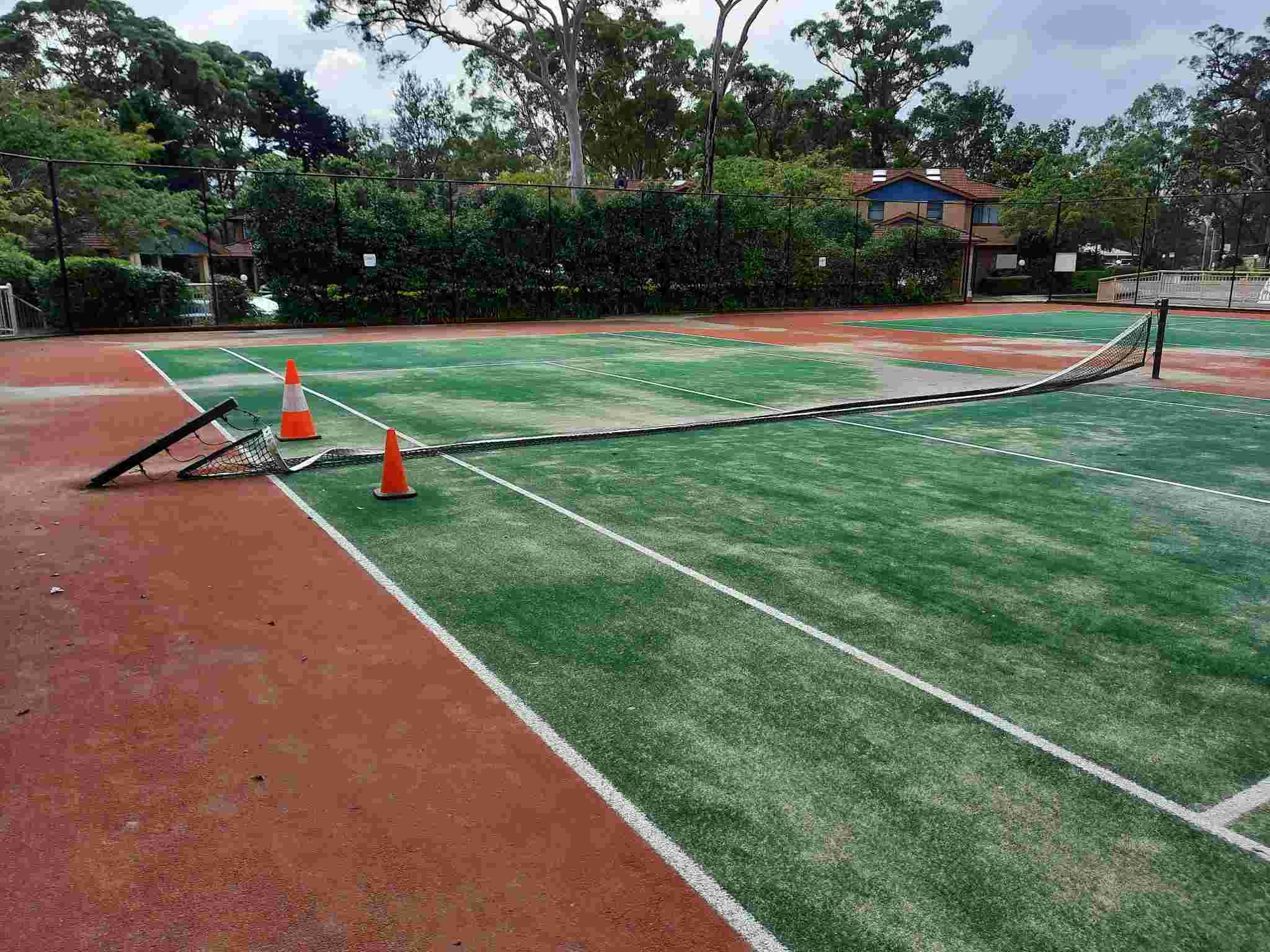 SP52948-tennis-court-1-damage-photo-5-12Apr2022.jpg