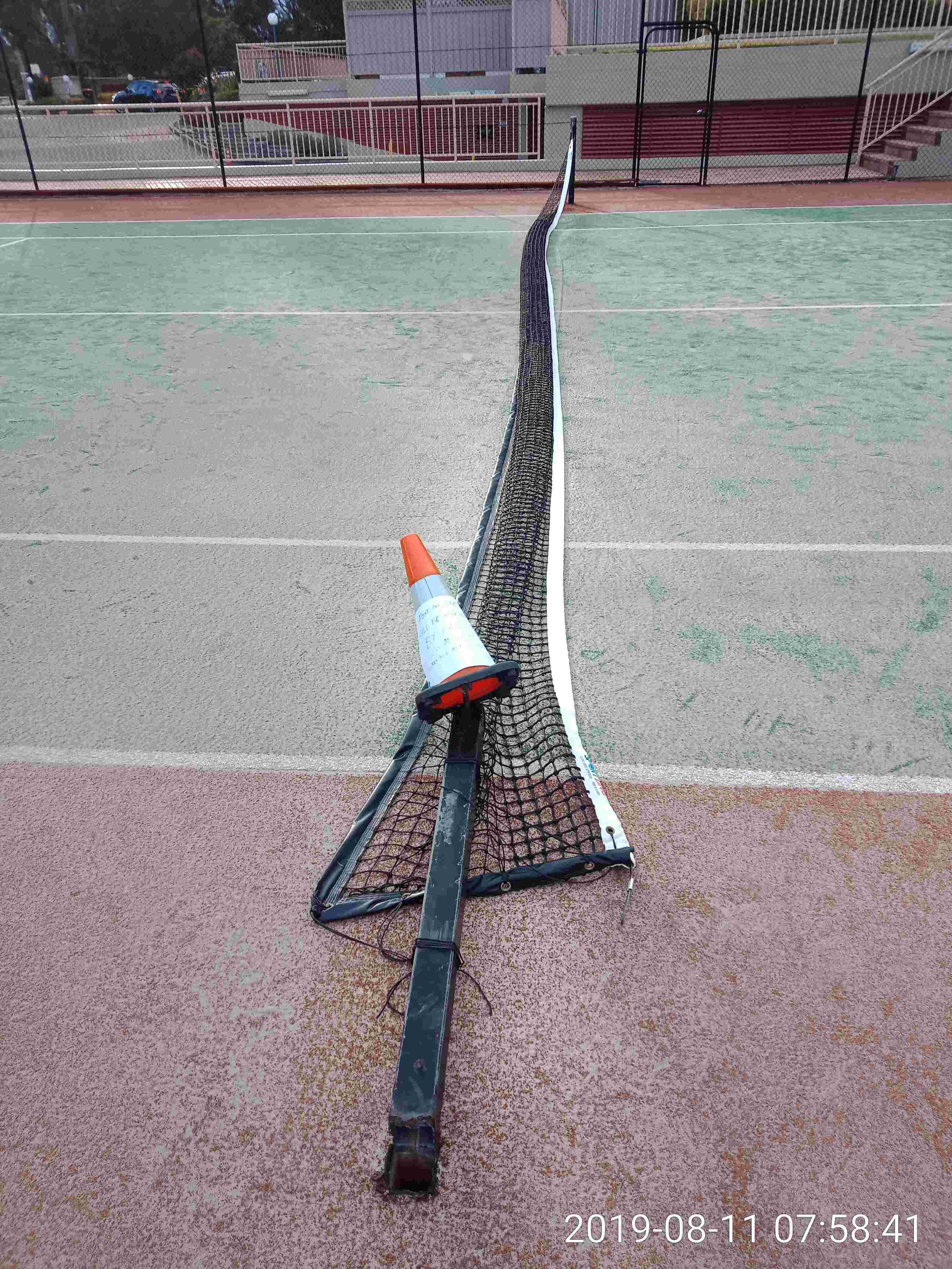 SP52948-tennis-court-2-damage-photo-6-11Aug2019.jpg