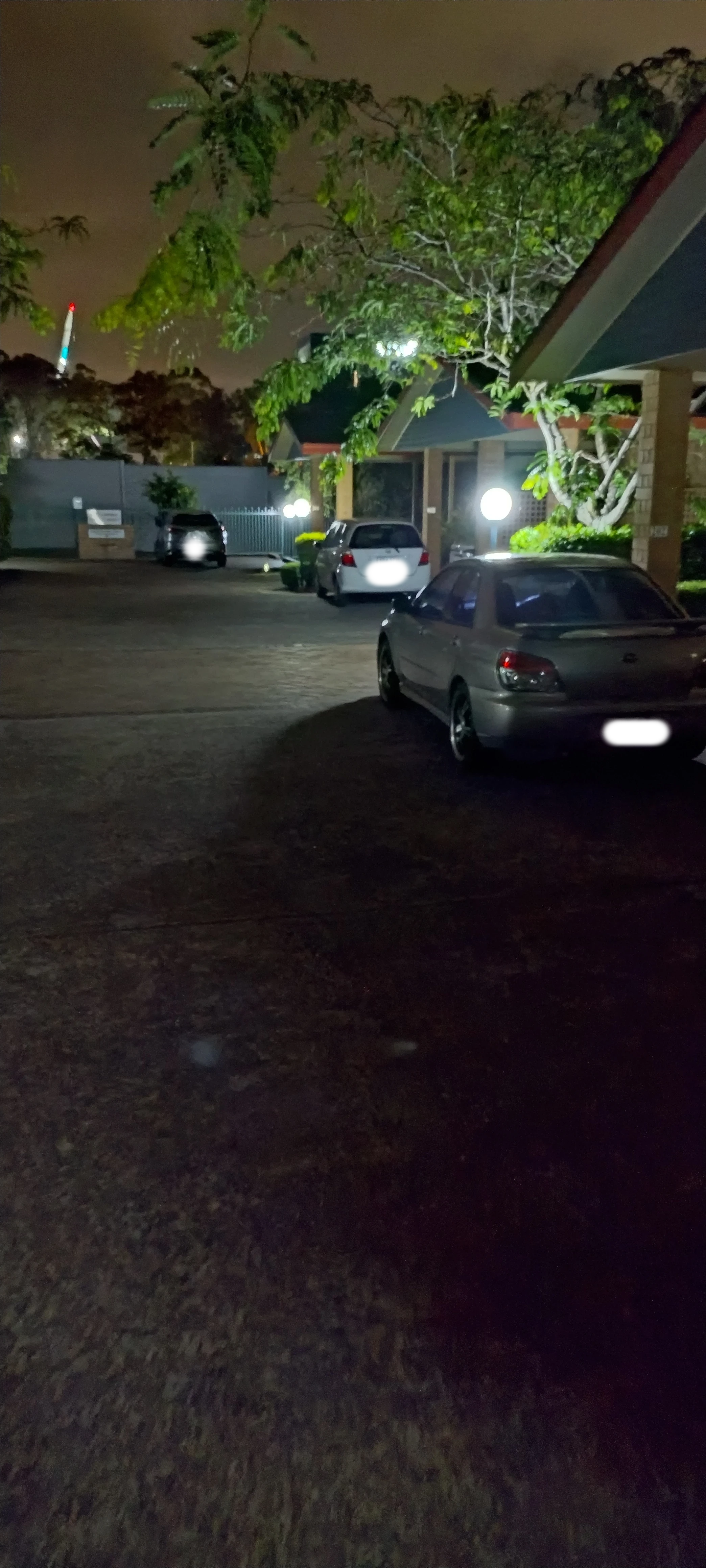SP52948-three-illegally-parked-cars-in-front-of-committee-member-towhouse-Lot-200-and-carwash-area-photo-1-12Nov2022.webp