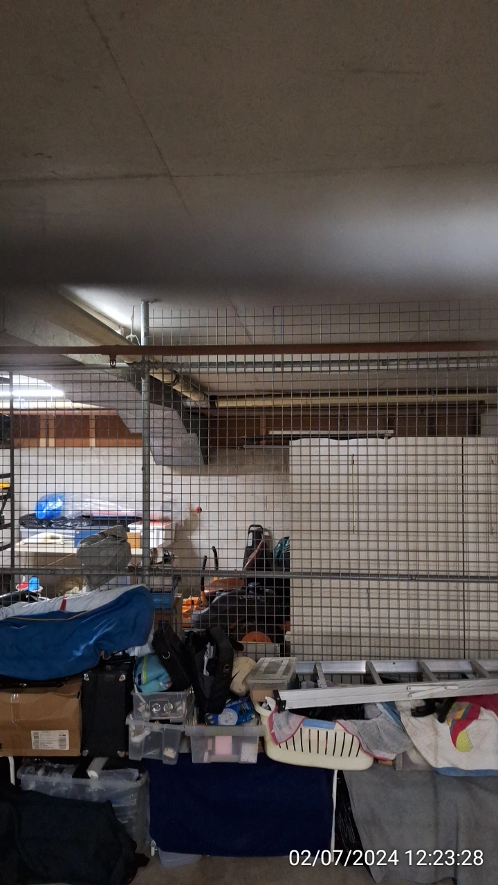 SP52948-Block-A-Lot-147-Uniqueco-Property-Services-abusing-private-garage-for-parking-ride-on-mower-2Jul2024