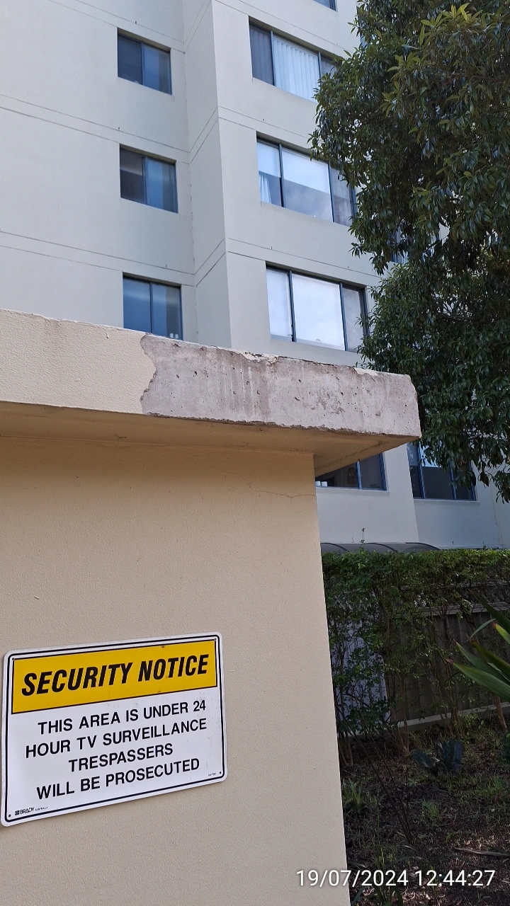 SP52948-Block-B-damaged-wall-near-fire-exit-19Jul2024