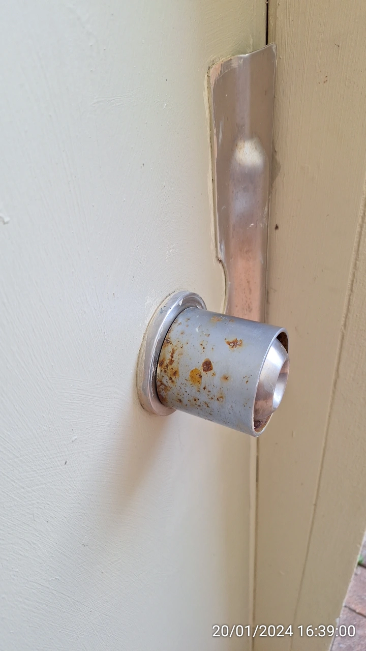 SP52948-Block-B-rusted-fire-door-handle-photo-1-20Jan2024.webp